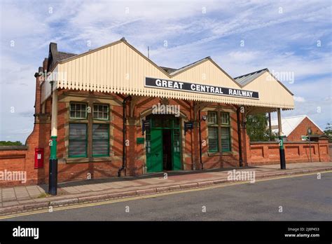 Old fashioned train station facade Stock Photo - Alamy