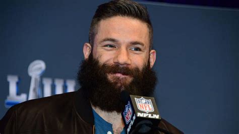 Super Bowl 2019 MVP Julian Edelman lets Ellen shave his beard to raise ...