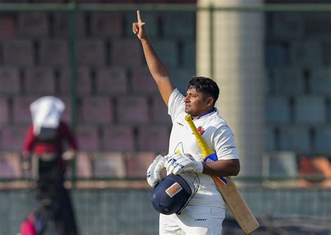 Sarfaraz Khan gestures after his hundred | ESPNcricinfo.com