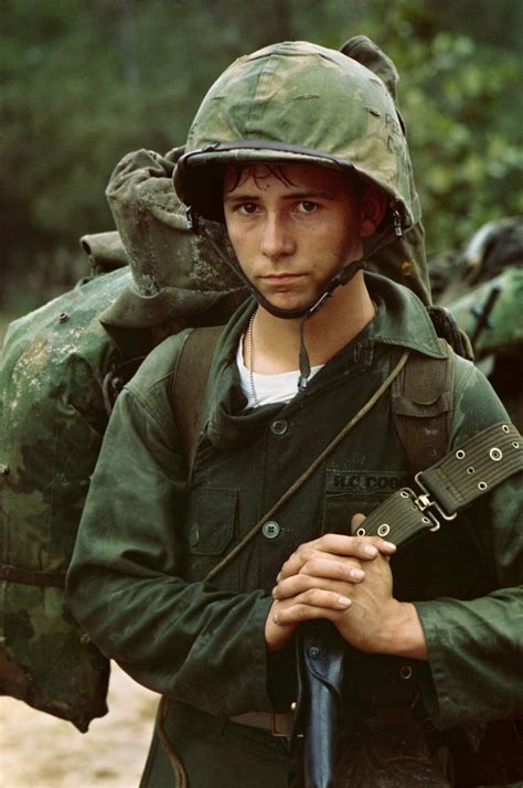 A young private waits on the beach during the Marine landing at Da Nang ...