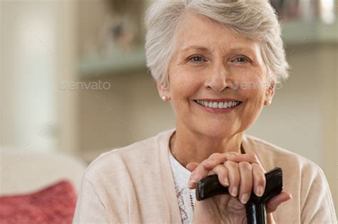 Elderly woman smiling at home Stock Photo by Rido81 | PhotoDune
