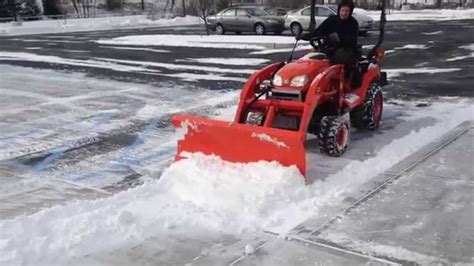 Kubota BX-25D Plowing Snow - YouTube