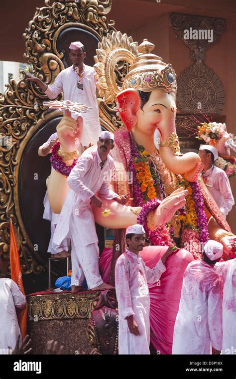 People at religious procession during Ganpati visarjan ceremony, Mumbai, Maharashtra, India ...