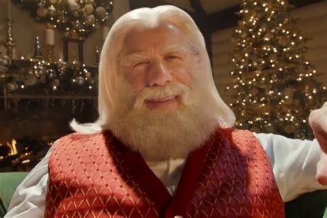 John Travolta Is Totally Unrecognizable as Santa Claus in Capital One Ad