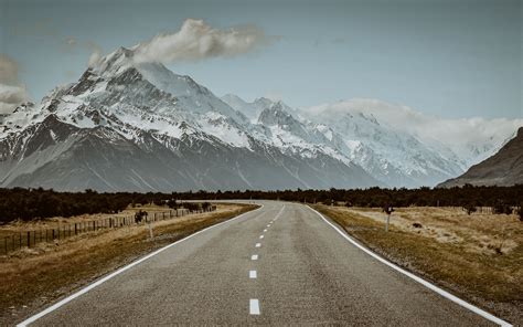 Download wallpaper 3840x2400 road, mountains, snow, clouds, landscape 4k ultra hd 16:10 hd ...