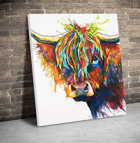 highland cow canvas with big colourful fringe, leaning against wall ...