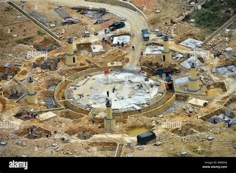 --FILE--Aerial view of the construction site of the world's largest radio telescope called FAST ...