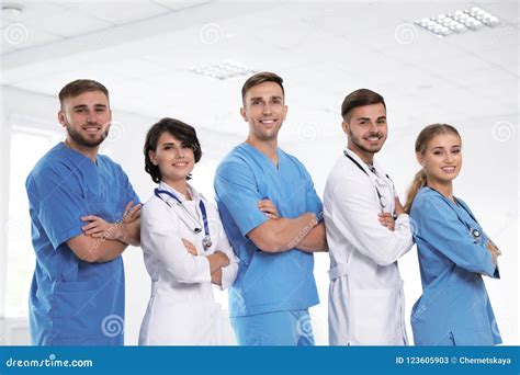 Team of doctors in uniform stock image. Image of clinical - 123605903