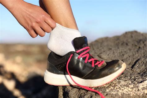 Runner Putting on Fitness Shoes and Running Shoes Stock Photo - Image ...