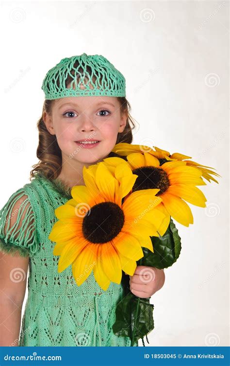 Girl with sunflowers stock image. Image of adorable, blooming - 18503045