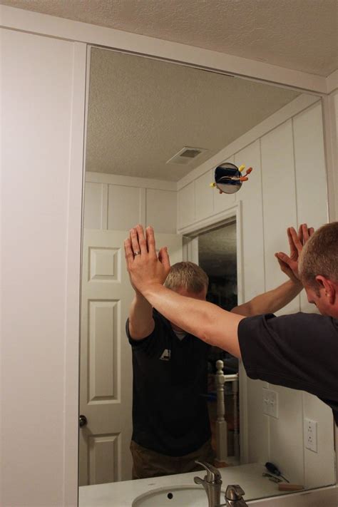 How to Professionally Install a Bathroom Mirror | Bathroom mirror, Bathroom red, Gym mirrors