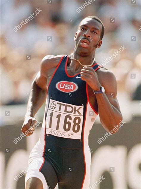 Michael Johnson 400M - Michael Johnson Of The Usa Stands On The Field ...