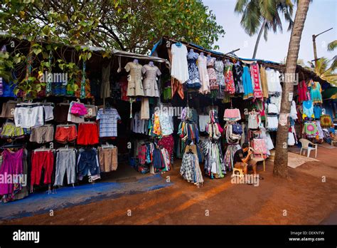 Clothes hanging at market stall, Calangute Bazaar, Calangute, North Stock Photo: 60670537 - Alamy