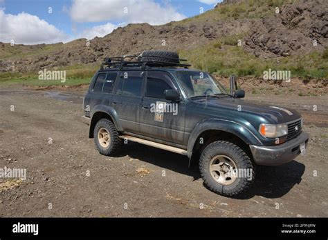 A Lexus 450 on an off-road trip through Mongolia. The car was almost ...