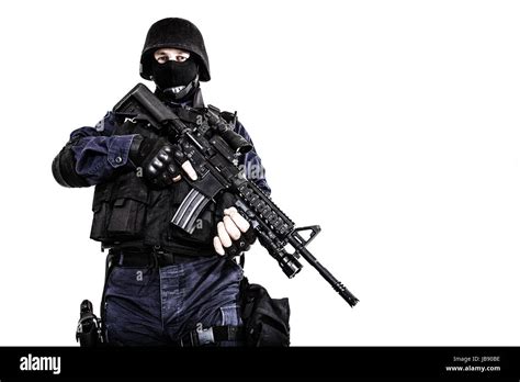 Special weapons and tactics (SWAT) team officer with his gun Stock Photo - Alamy