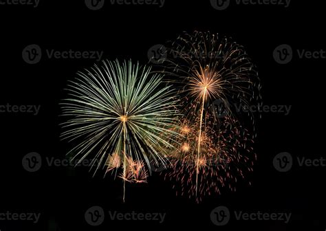 Abstract festive colorful fireworks explosion on black background ...