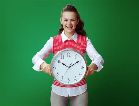 Student Showing White Round Clock on Green Background Stock Photo - Image of educate ...
