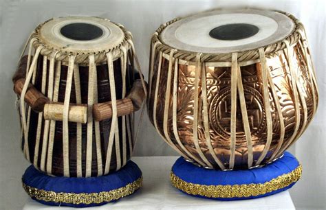 Tabla drums are typically an Indian instrument that are played by using different fingers to ...