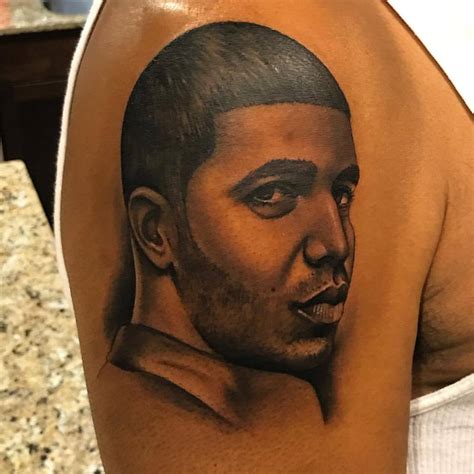 Drake’s Dad Adds Drake’s Face to His Collection of OVO Ink | Complex