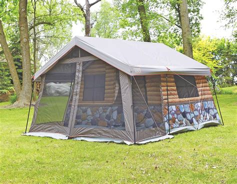 This Log Cabin Tent Has a Giant Screened In Front Porch For a True Luxury Camping Experience ...