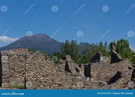 Excavated Ruins Of Pompeii And Mount Vesuvius In The Background Stock Image | CartoonDealer.com ...