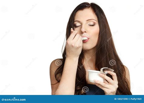 Enjoying taste of yogurt stock photo. Image of facial - 18521590