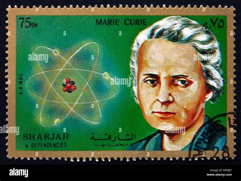 SHARJAH - CIRCA 1972: a stamp printed in the Sharjah UAE shows Marie Sklodowska Curie, and ...