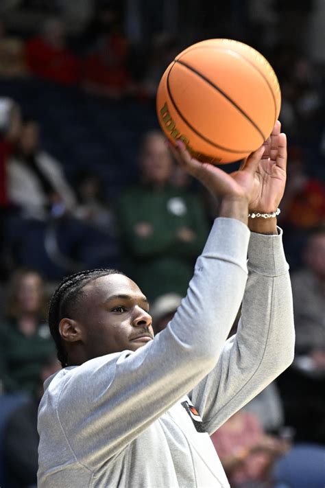 Bronny James mostly watches warmups with his No. 23 Southern California ...