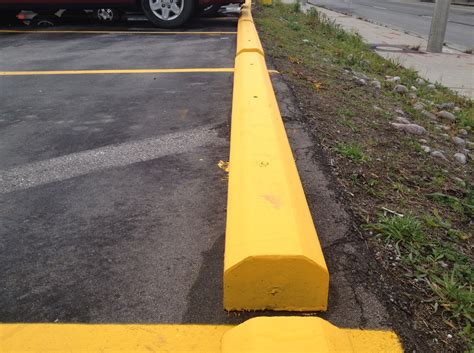 Sure Seal Pavement Maintenance Inc. Provides Recycled Parking Curbs in Toronto