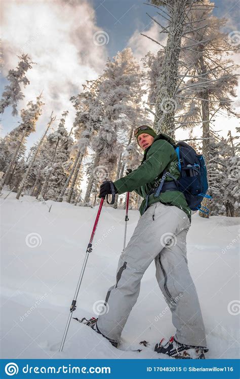 View of the Hiker Snowshoeing in the Winter Forest. Stock Image - Image of backpack, lifestyle ...