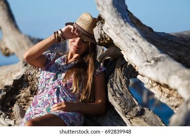 Young Girl Hat Relaxing On Beach Stock Photo (Edit Now) 692839948