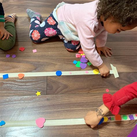 Sticky Tape Shapes Activity - Happy Toddler Playtime