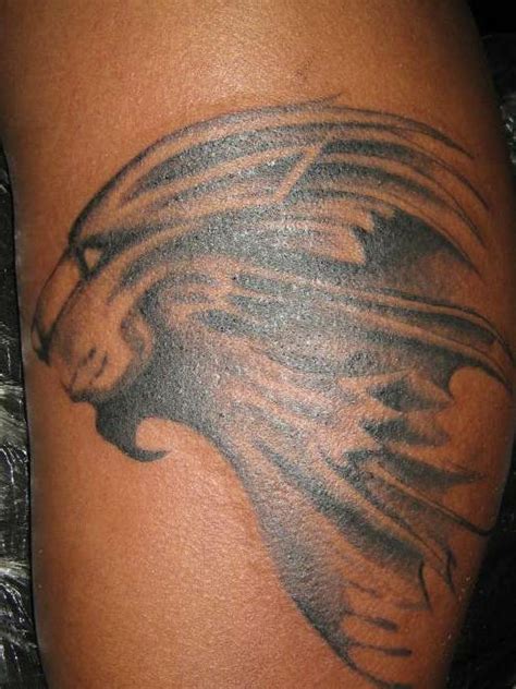 Lion profile black ink tattoo - Tattooimages.biz