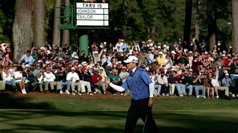 Zach Johnson celebrates his birdie putt on the 16th green during the ...