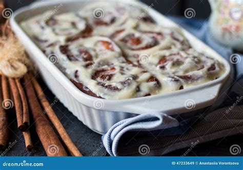 Cinnabon Buns with Cinnamon and Nuts in Baking Dish Stock Image - Image ...