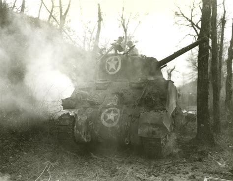 All five members of a Sherman tank crew return on foot as their vehicle ...