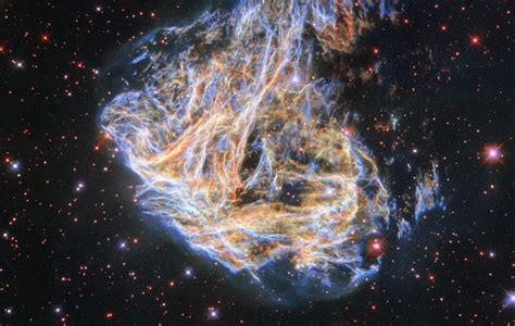 A new Hubble Image Reveals a Shredded Star in a Nearby Galaxy ...