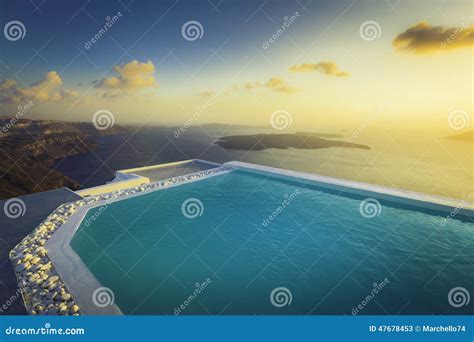 Infinity Pool on the Rooftop at Sunset in Santorini Island Stock Image ...