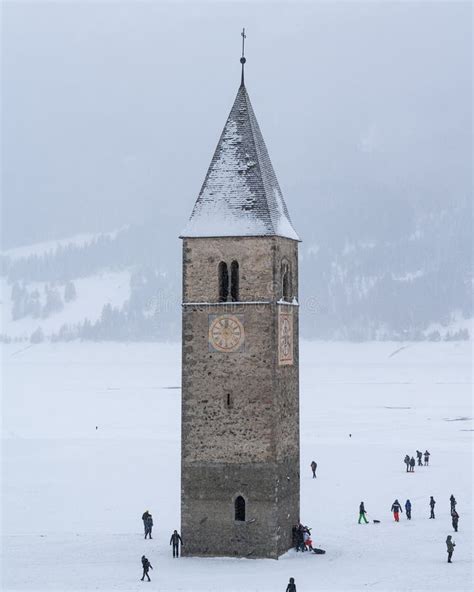 The Famous Bell Tower at Lago Di Resia during Winter, Alto Adige Stock ...