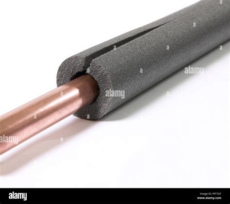 Pipe insulation around a copper pipe Stock Photo - Alamy