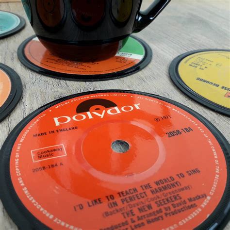 set of six vinyl record coasters by vinyl village | notonthehighstreet.com