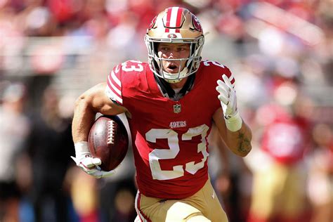 49ers' Christian McCaffrey's 4 TDs break records, earn LeBron's love