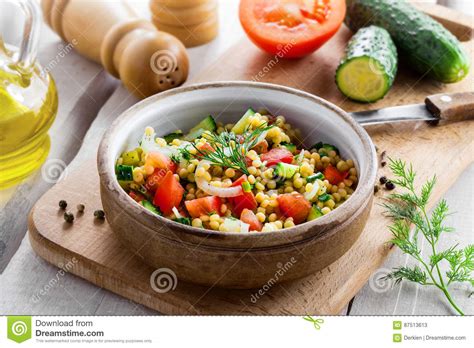 Couscous with Vegetables. Israeli Ptitim. Stock Image - Image of cucumber, appetizer: 87513613