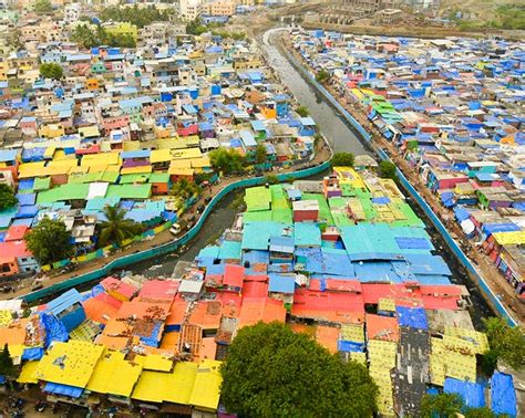 The homes in Mumbai slum Khar are painted by Chal Rang De volunteers | Architectural Digest India