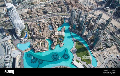 Spectacular aerial view from Burj Khalifa, looking down to the fountain from the very top of the ...