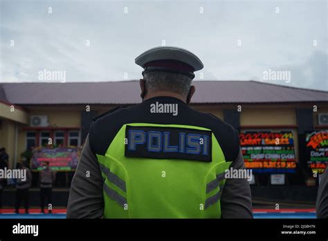 Indonesian police wear full uniform Stock Photo - Alamy