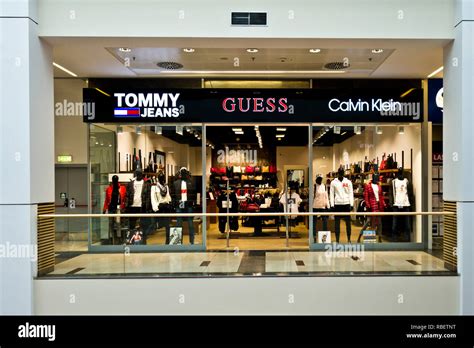 shop in a mall with famous fashion brands Stock Photo - Alamy