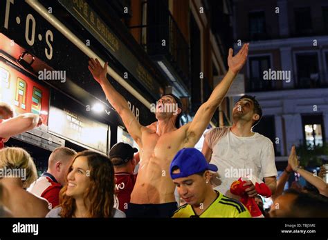 Liverpool fans celebrate in Madrid after seeing their team win the ...