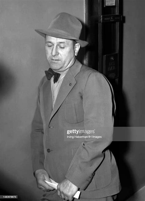 Harry Bennett , is shown during the 1941 Ford Motor Company Strike at ...