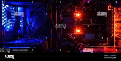 Computer with circuit board and internal LED RGB lights, hardware inside open high performance ...